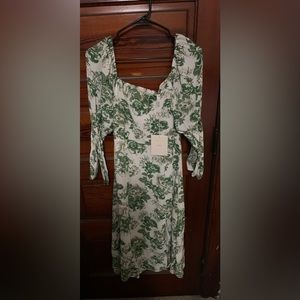 70/21 Smocked green floral midi dress
